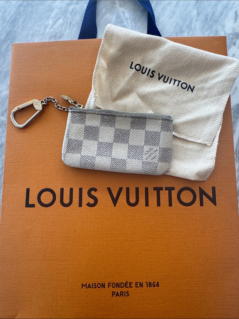 Louis Vuitton Damier Azur Mini Zippy Key Pouch in White and Gray with dust bag.